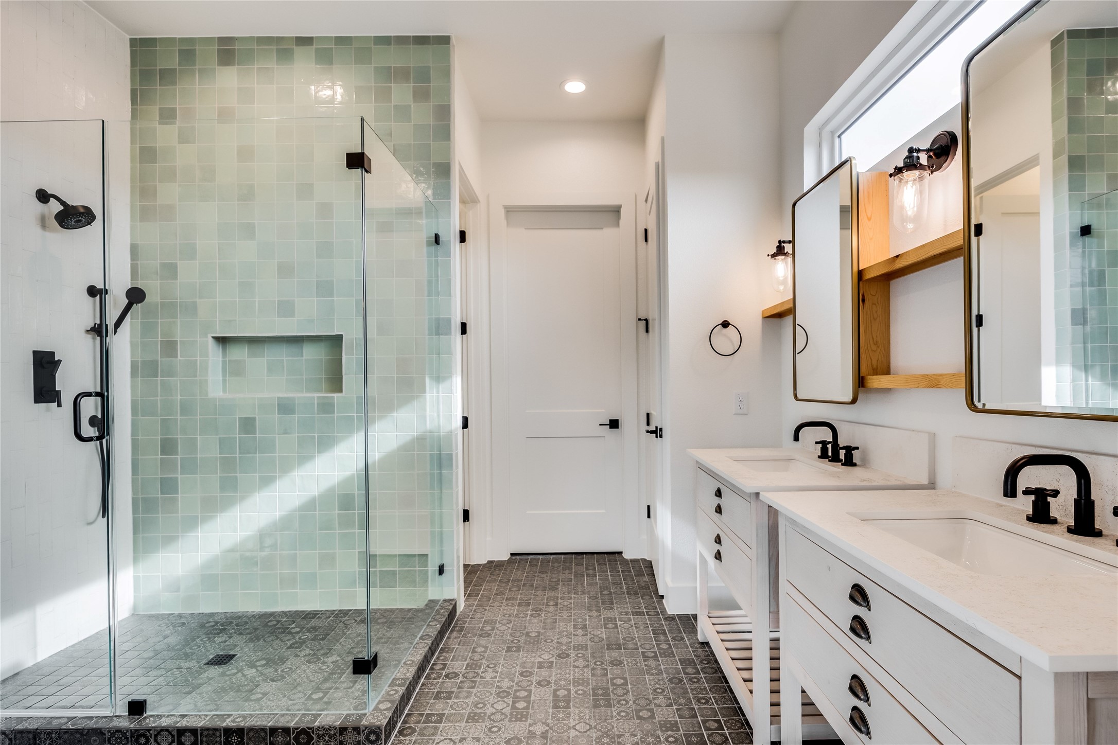 288 Smoke Tree Circle Dripping Springs, TX 78620 - Photo 13 of 40 a bathroom with a double vanity sink mirror and shower
