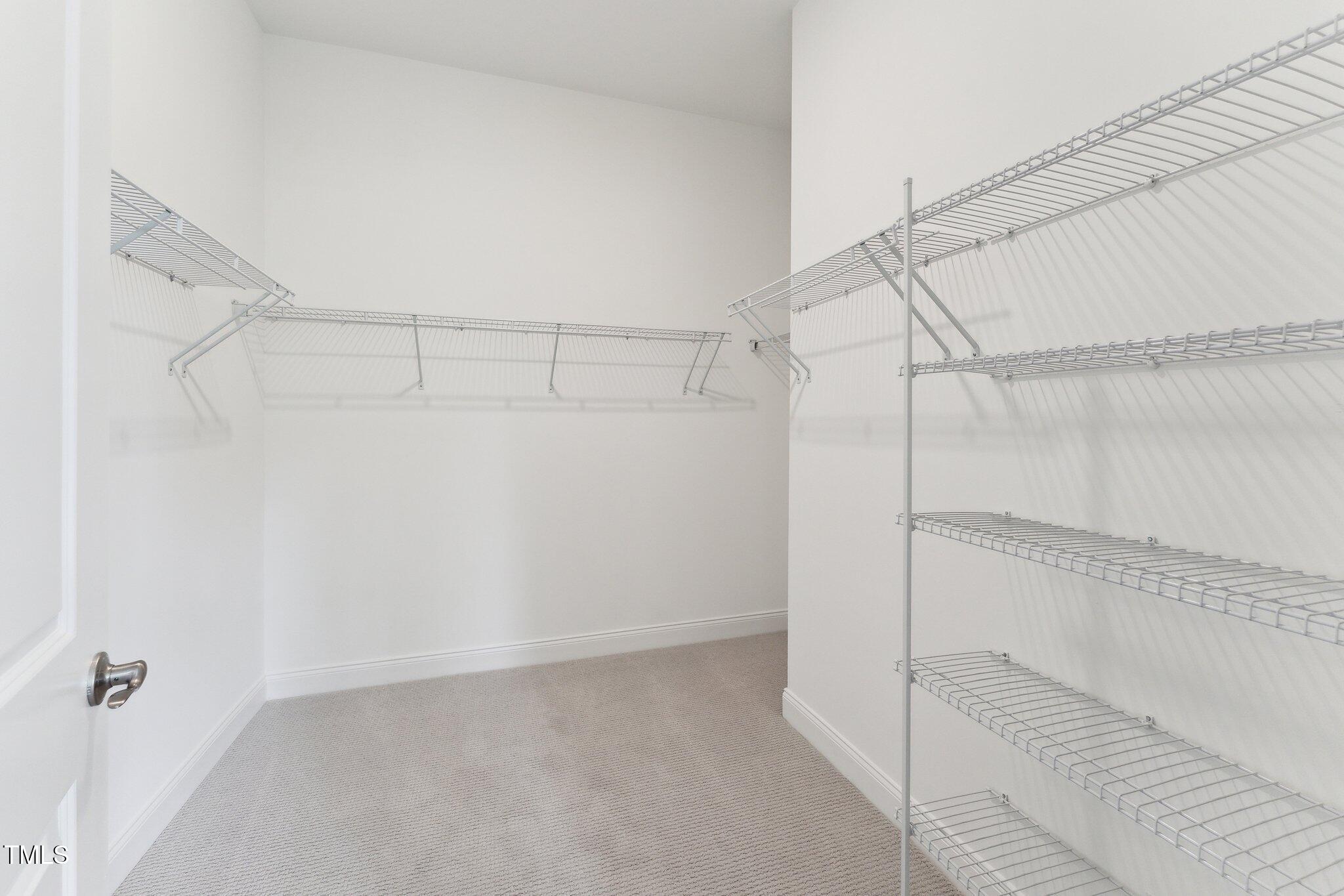 528 Gainer Drive, Unit 8 Raleigh, NC 27610 - Photo 22 of 29 8 primary closet