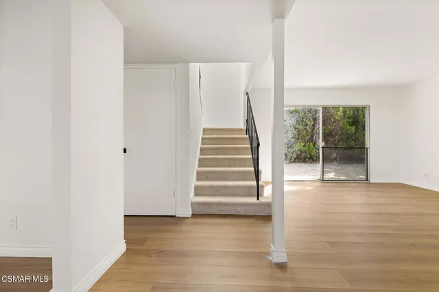 a view of entryway with stairs