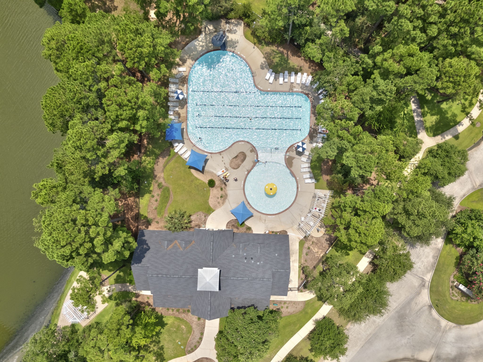 6643 Knollbridge Lane Spring, TX 77379 - Photo 35 of 50 Windrose has two swimming pools which include one Junior Olympic pool.