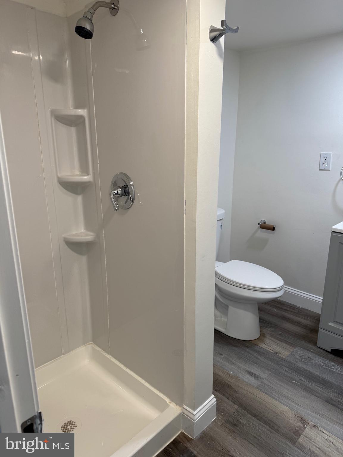 132 Walnut Street Colwyn, PA 19023 - Photo 16 of 43 a bathroom with a toilet and a shower