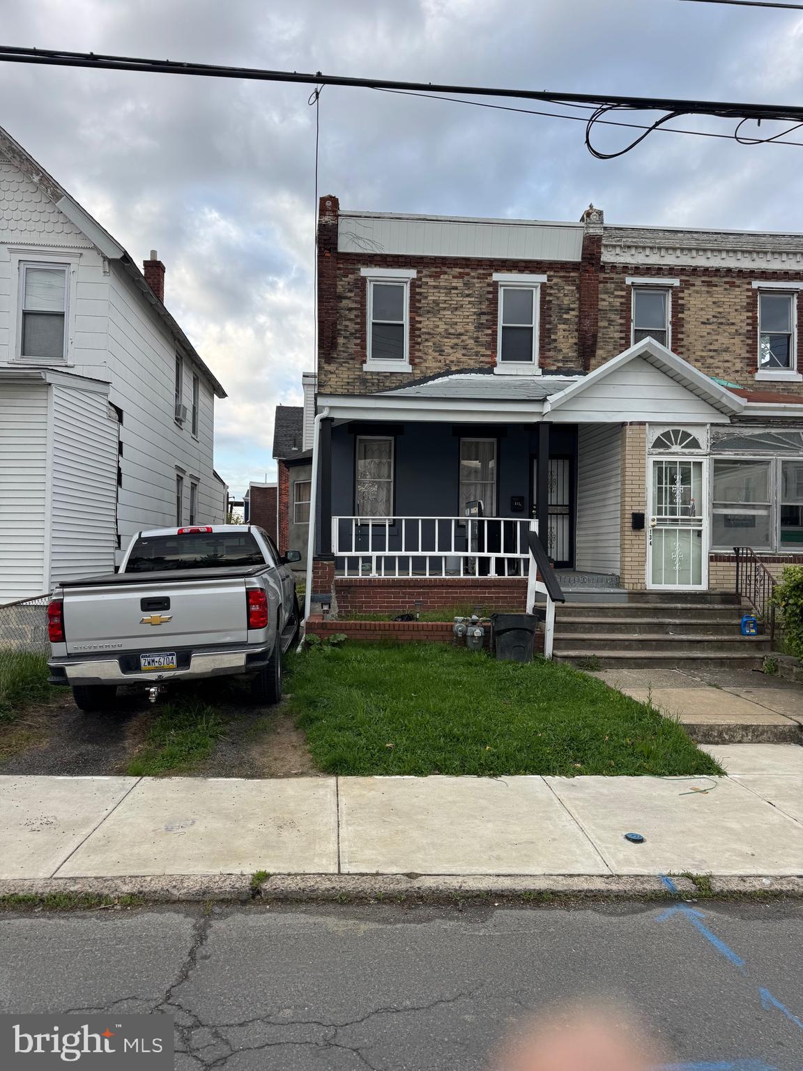 132 Walnut Street Colwyn, PA 19023 - Photo 2 of 43 a car parked in front of a house