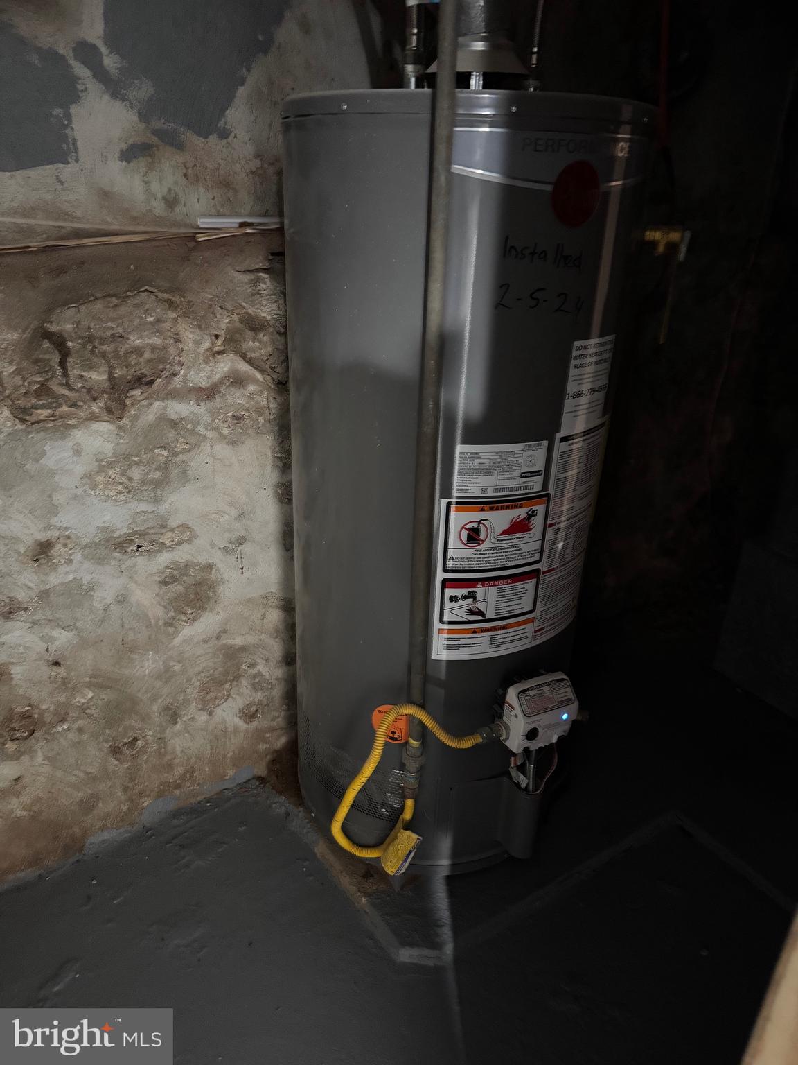 132 Walnut Street Colwyn, PA 19023 - Photo 22 of 43 a picture of water heater room