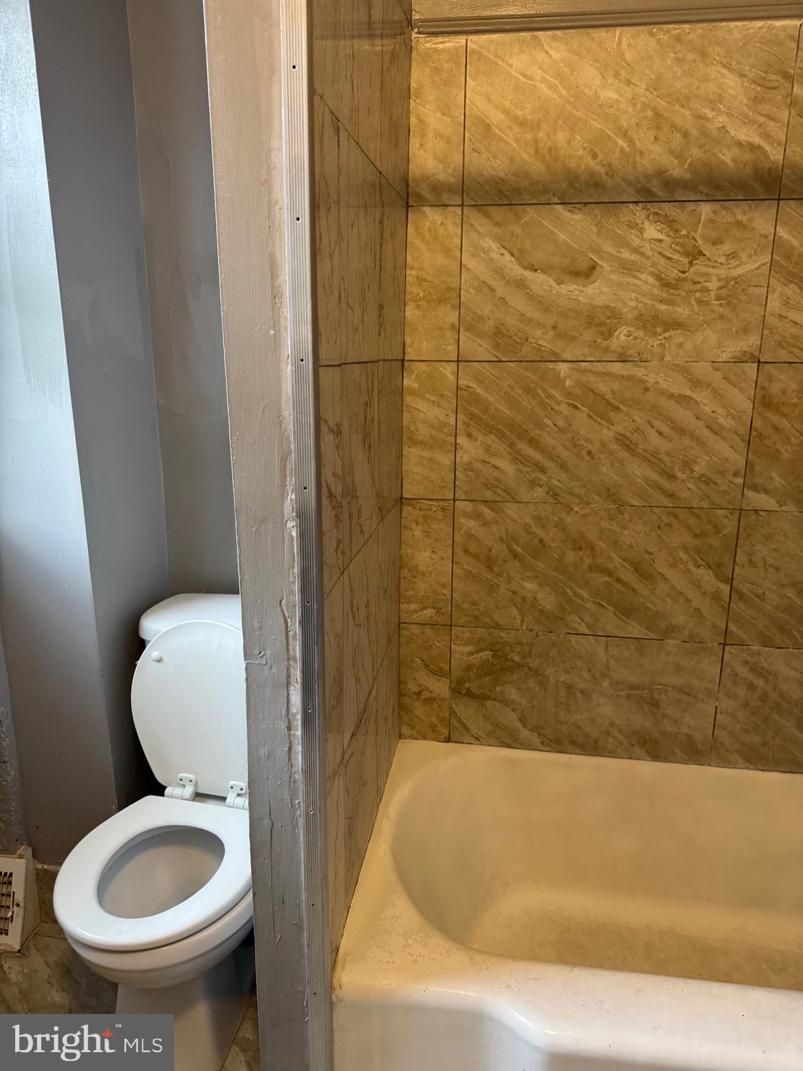132 Walnut Street Colwyn, PA 19023 - Photo 31 of 43 a bathroom with a toilet and a sink