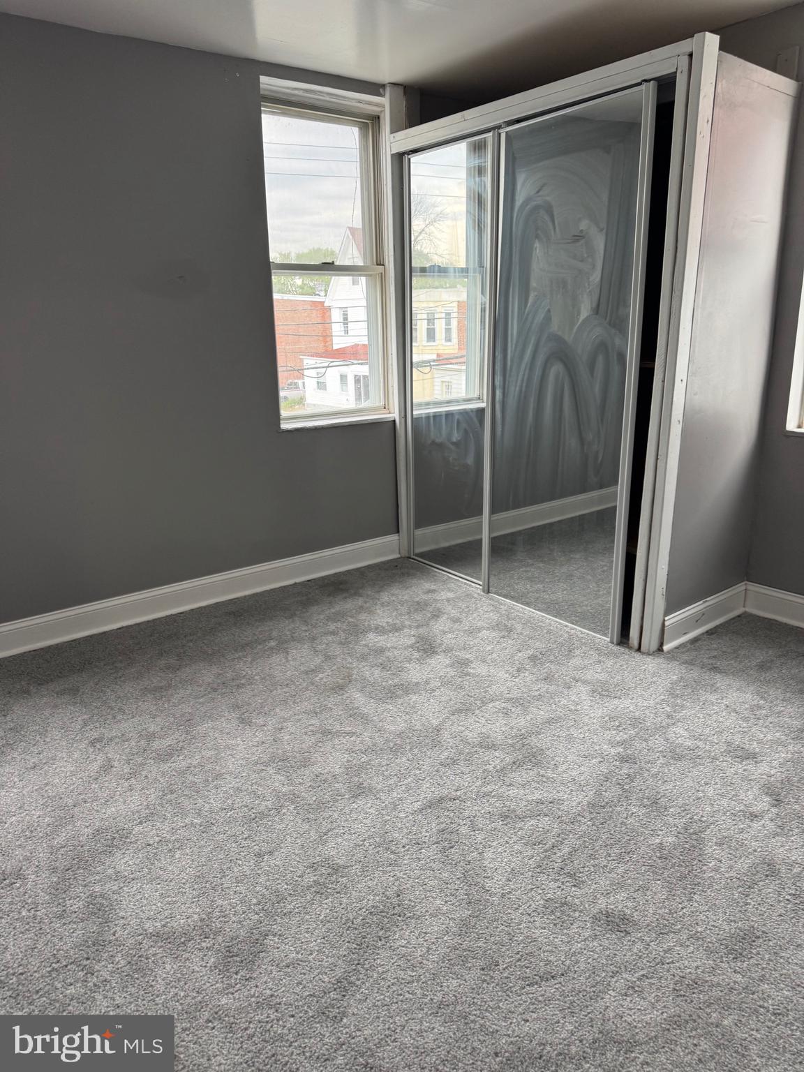 132 Walnut Street Colwyn, PA 19023 - Photo 35 of 43 an empty room with windows