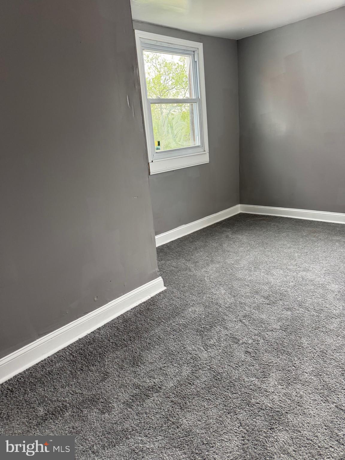 132 Walnut Street Colwyn, PA 19023 - Photo 42 of 43 an empty room with a window
