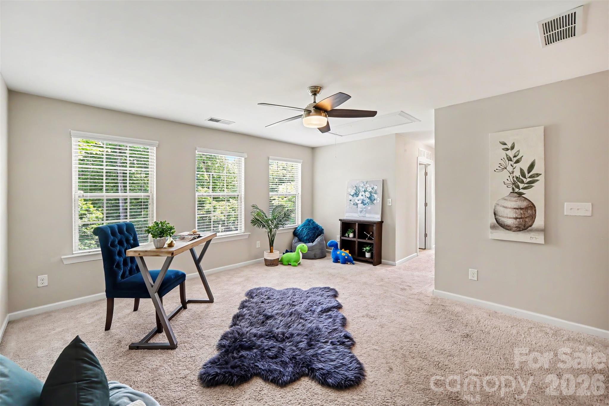 1029 Archibald Avenue Fort Mill, SC 29708 - Photo 23 of 45 a living room with furniture and a window