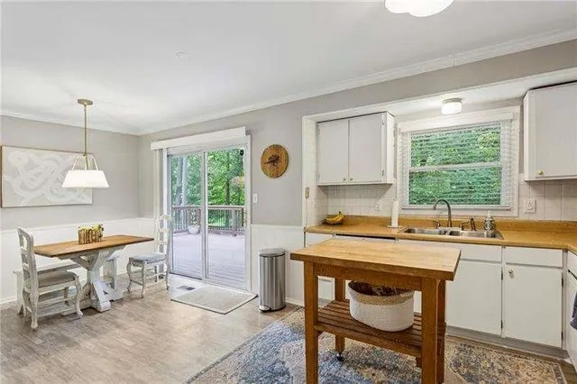 a kitchen that has a cabinets counter space and a window