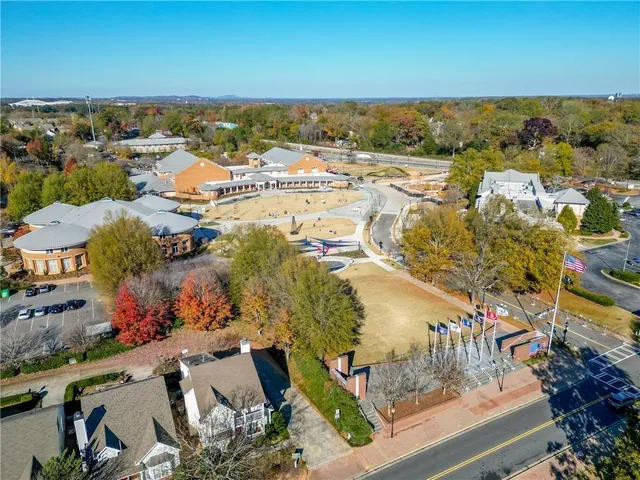 an aerial view of residential building and parking space