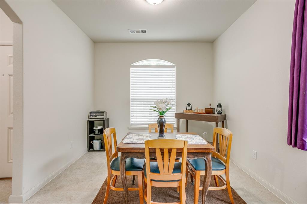136 Kennedy Drive Venus, TX 76084 - Photo 5 of 27 a view of a dining room with furniture and window