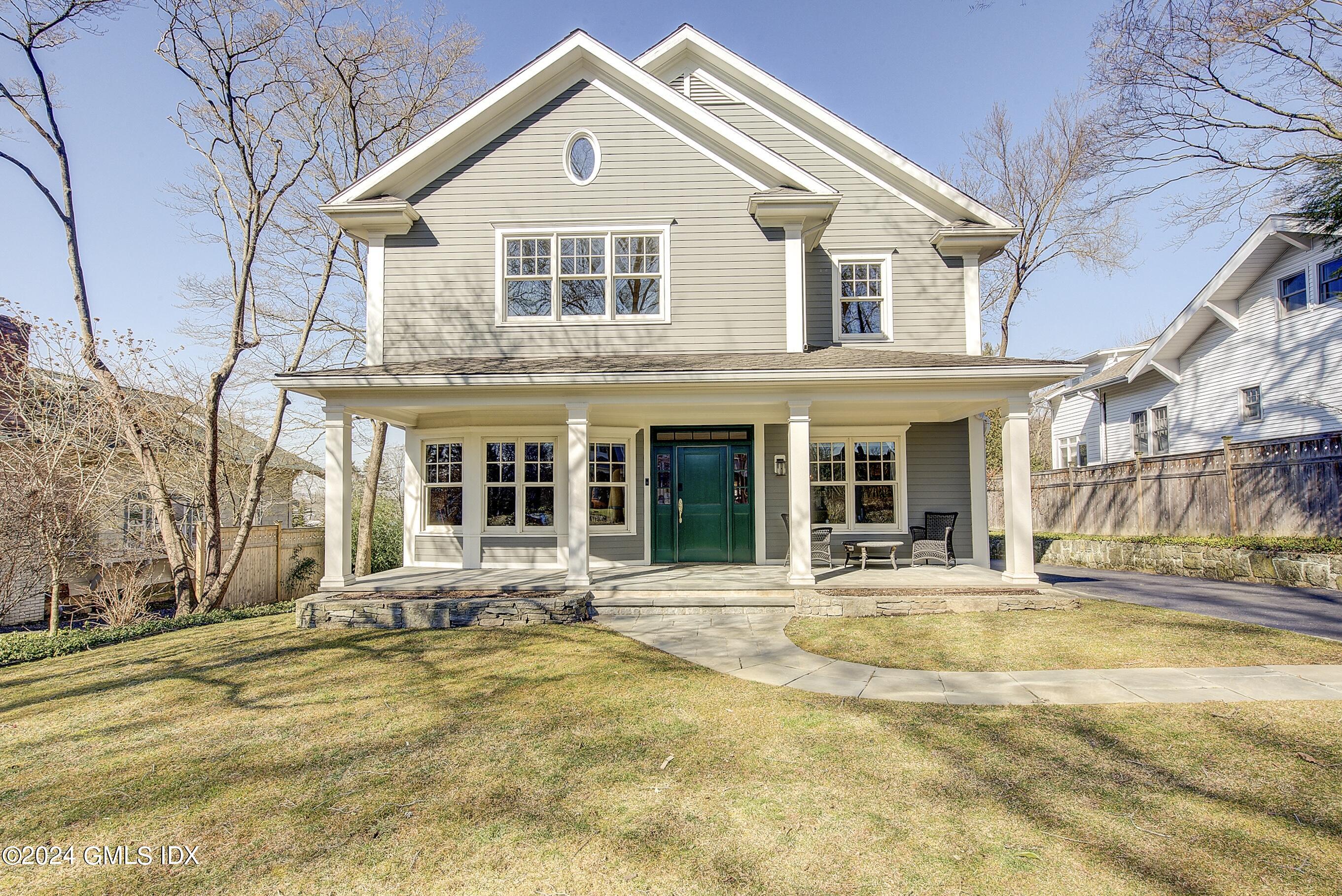 a front view of a house with a outdoor space