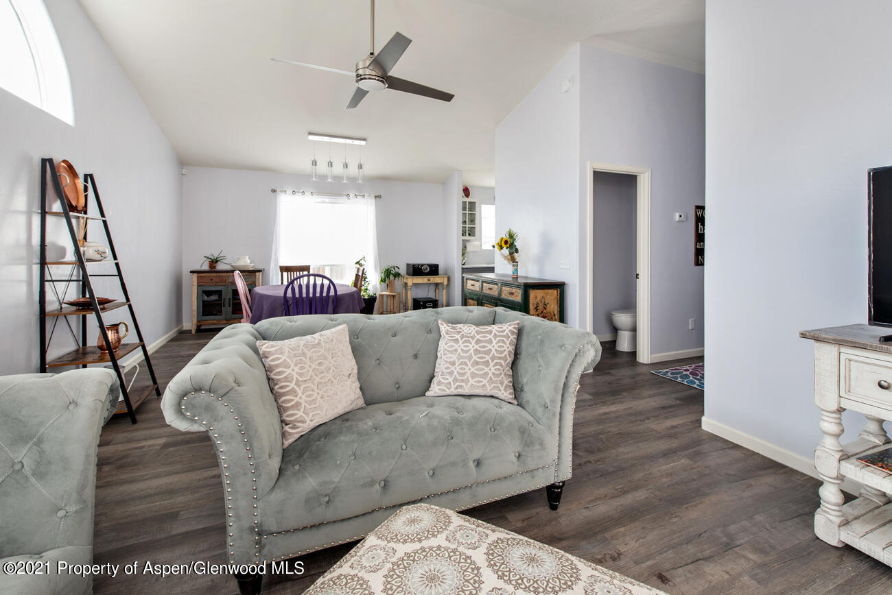 1784 Anvil View Avenue Rifle, CO 81650 - Photo 11 of 29 a living room with furniture and a wooden floor