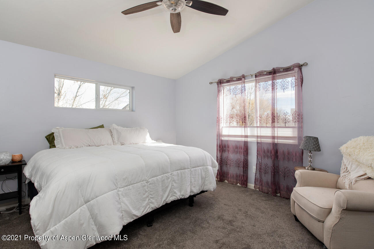 1784 Anvil View Avenue Rifle, CO 81650 - Photo 13 of 29 a bedroom with bed and window