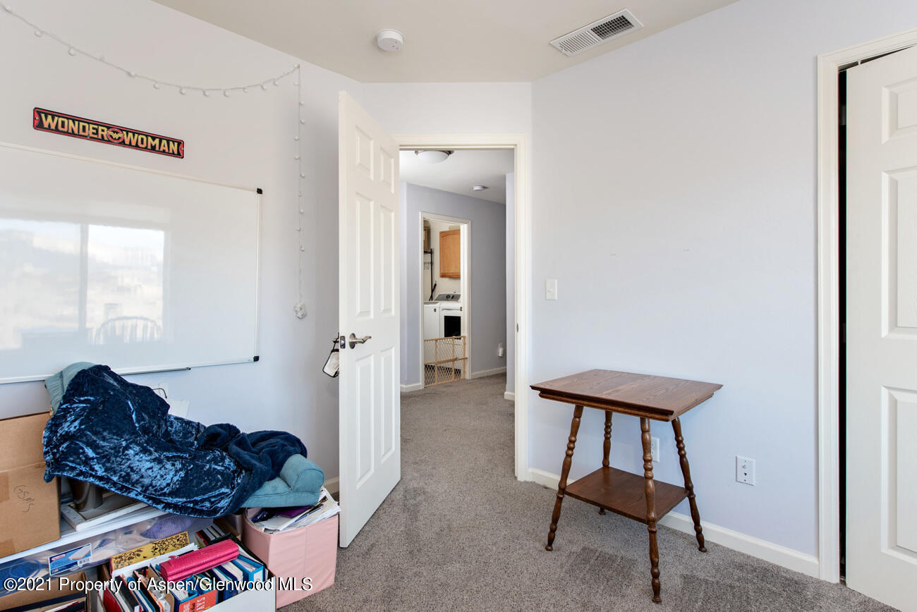 1784 Anvil View Avenue Rifle, CO 81650 - Photo 15 of 29 a living room with furniture and a window