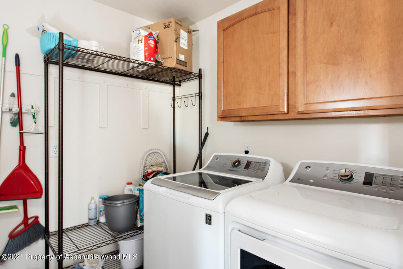 1784 Anvil View Avenue Rifle, CO 81650 - Photo 17 of 29 a utility room with dryer and washer
