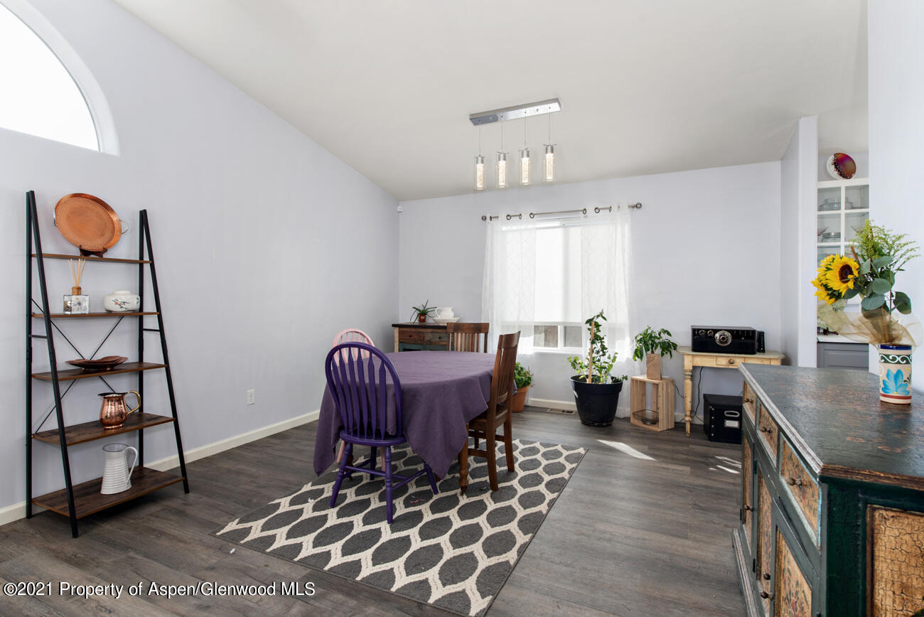 1784 Anvil View Avenue Rifle, CO 81650 - Photo 8 of 29 a living room with furniture and wooden floor
