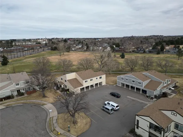 an aerial view of a house with a lake view