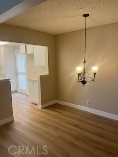 48 Clearbrook, Unit 56 Irvine, CA 92614 - Photo 3 of 6 a view of a room with wooden floor and an empty space