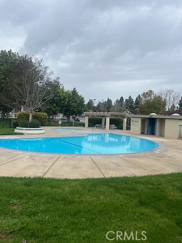 48 Clearbrook, Unit 56 Irvine, CA 92614 - Photo 6 of 6 a front view of a house with a big yard