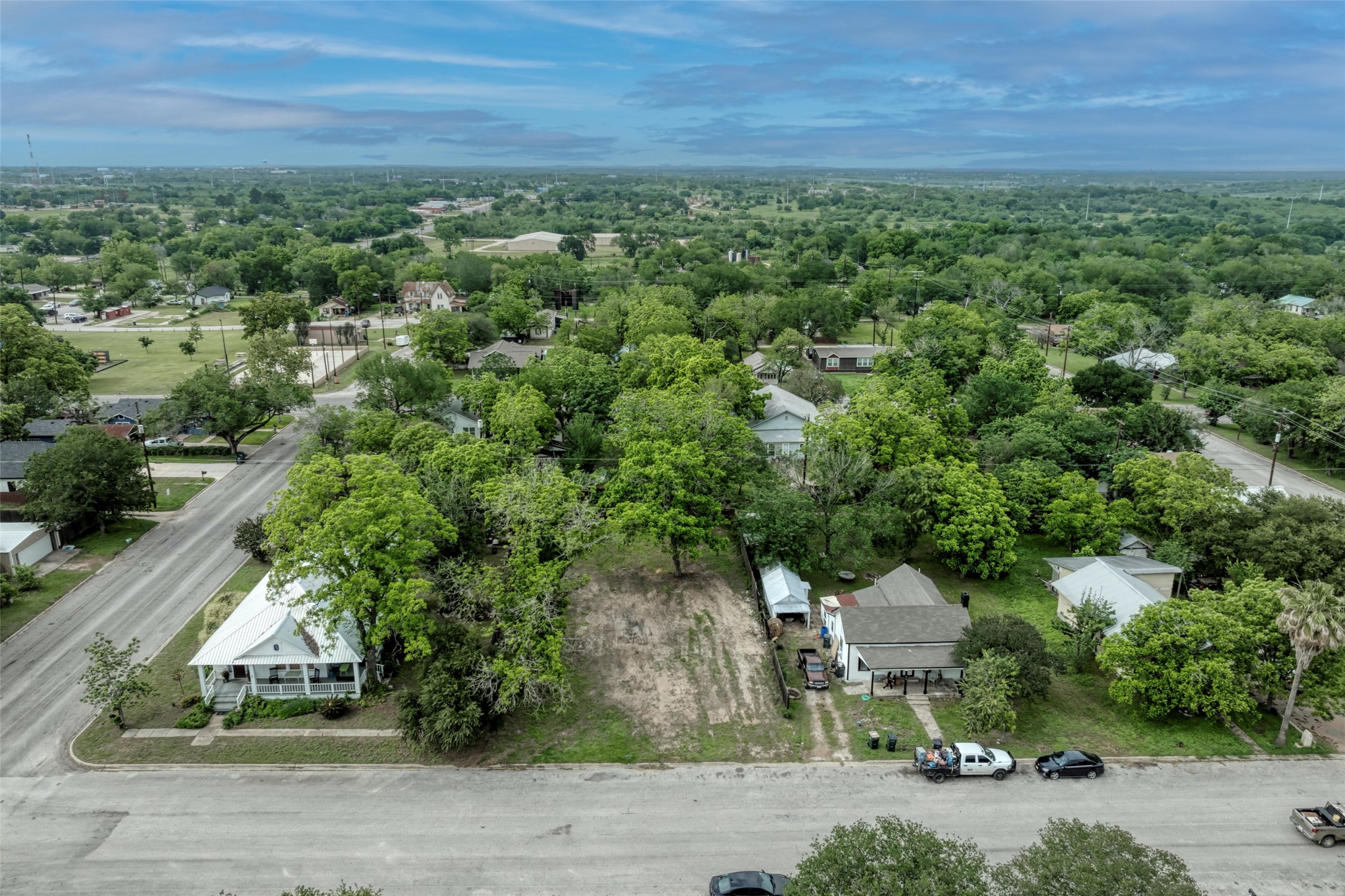 809 East Fannin Street Luling, TX 78648 - Photo 7 of 16 an aerial view of a house with a yard