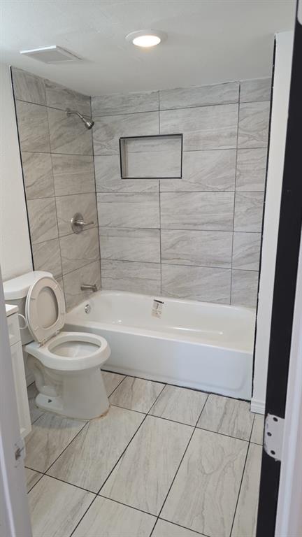 216 West 9th Street Bonham, TX 75418 - Photo 8 of 9 Bathroom with shower / bath combination, vanity, and recessed lighting