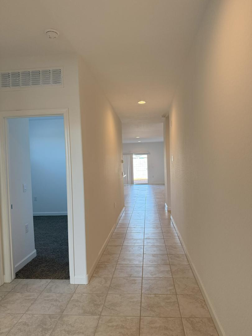 1840 West Spaulding Avenue Apache Junction, AZ 85120 - Photo 7 of 53 a view of a hallway with a room