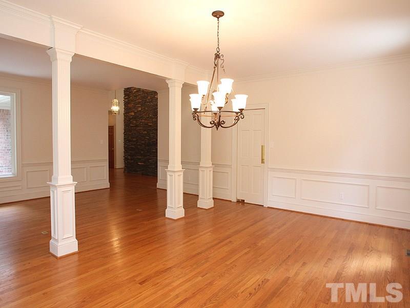 8216 Inverstone Lane Raleigh, NC 27606 - Photo 7 of 25 Hardwoods & wainscoting.