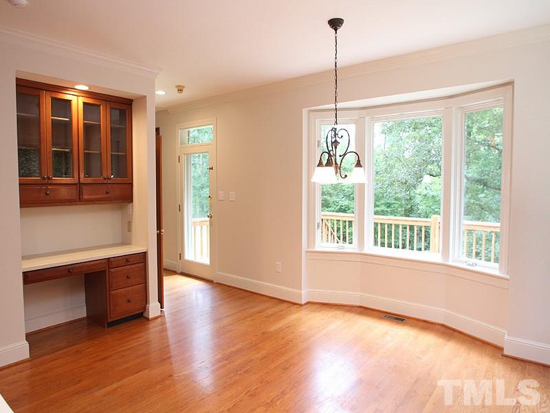 8216 Inverstone Lane Raleigh, NC 27606 - Photo 9 of 25 Bay window looks out over the backyard.