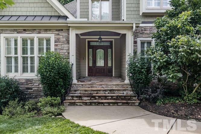 7026 Rippling Stone Lane Raleigh, NC 27612 - Photo 2 of 25 Welcoming, covered front porch.