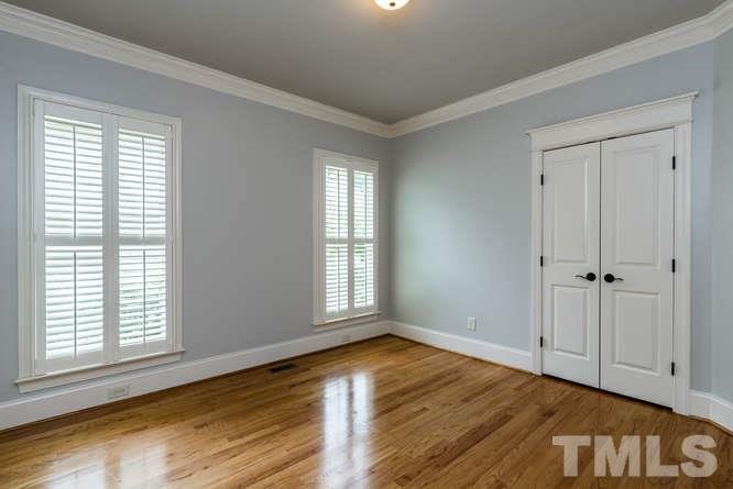 7026 Rippling Stone Lane Raleigh, NC 27612 - Photo 13 of 25 1st floor guest suite with full bath.