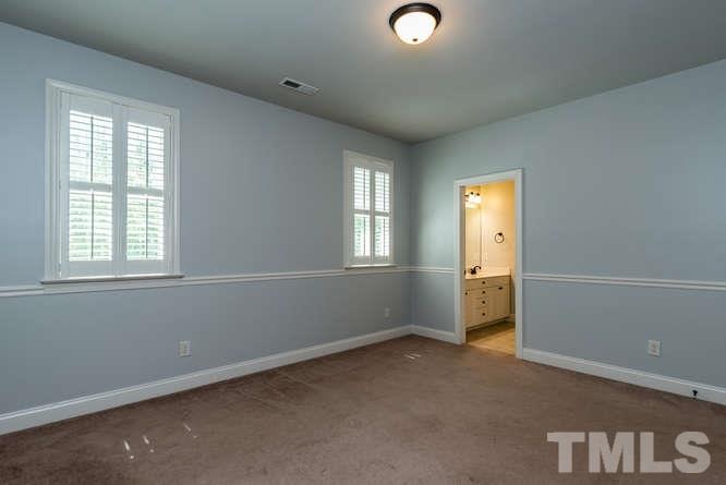 7026 Rippling Stone Lane Raleigh, NC 27612 - Photo 15 of 25 2nd floor bedroom with jack and jill bath.
