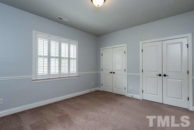 7026 Rippling Stone Lane Raleigh, NC 27612 - Photo 16 of 25 2nd floor bedroom. New paint throughout 1st and 2nd floor!!!