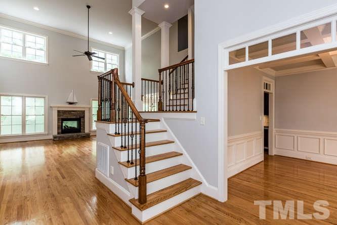 7026 Rippling Stone Lane Raleigh, NC 27612 - Photo 3 of 25 Open and bright, two story foyer.