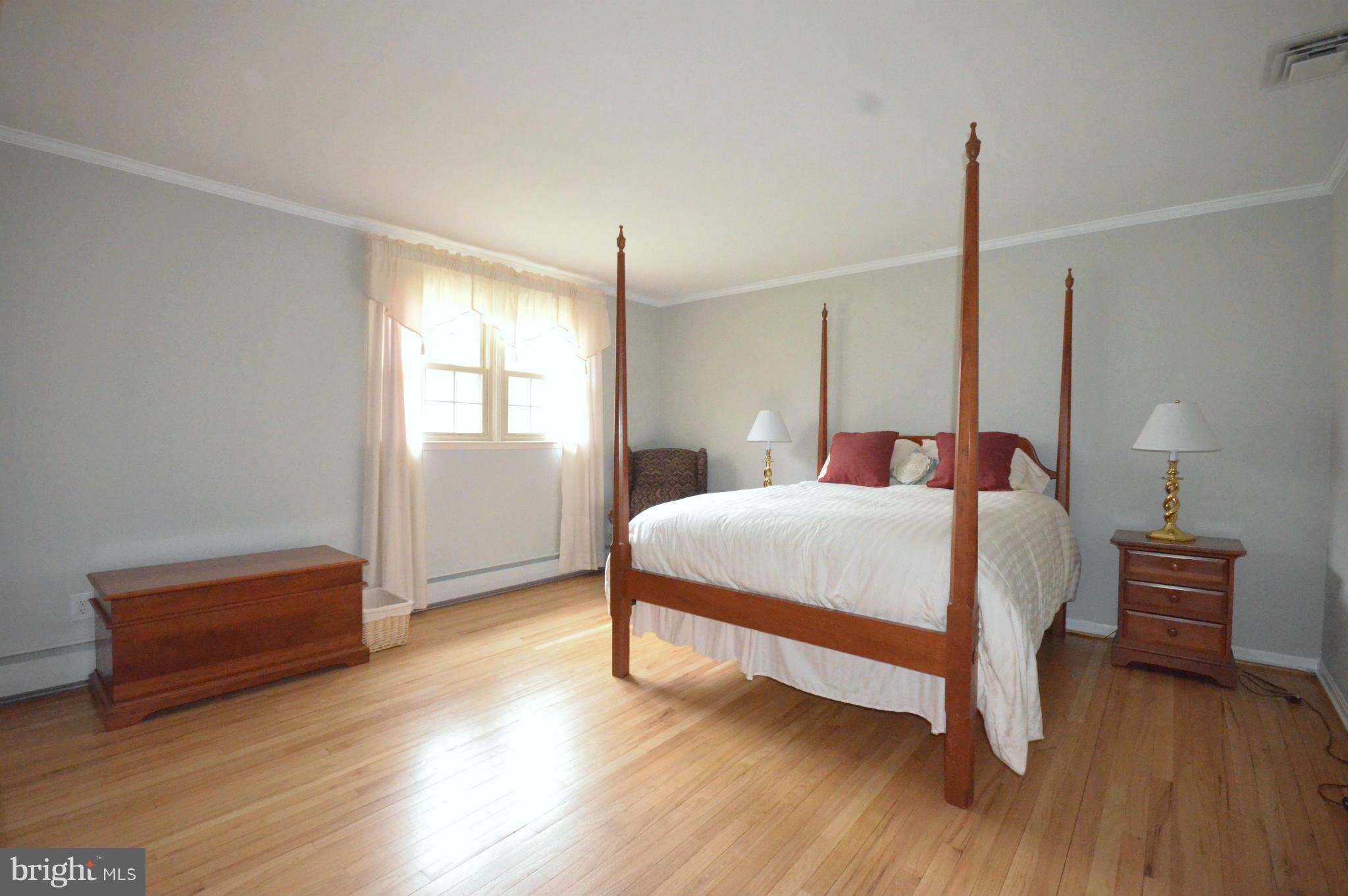 2406 Pot Spring Road Lutherville-Timonium, MD 21093 - Photo 22 of 30 Bedroom w/ en suite bath (former master bedroom)