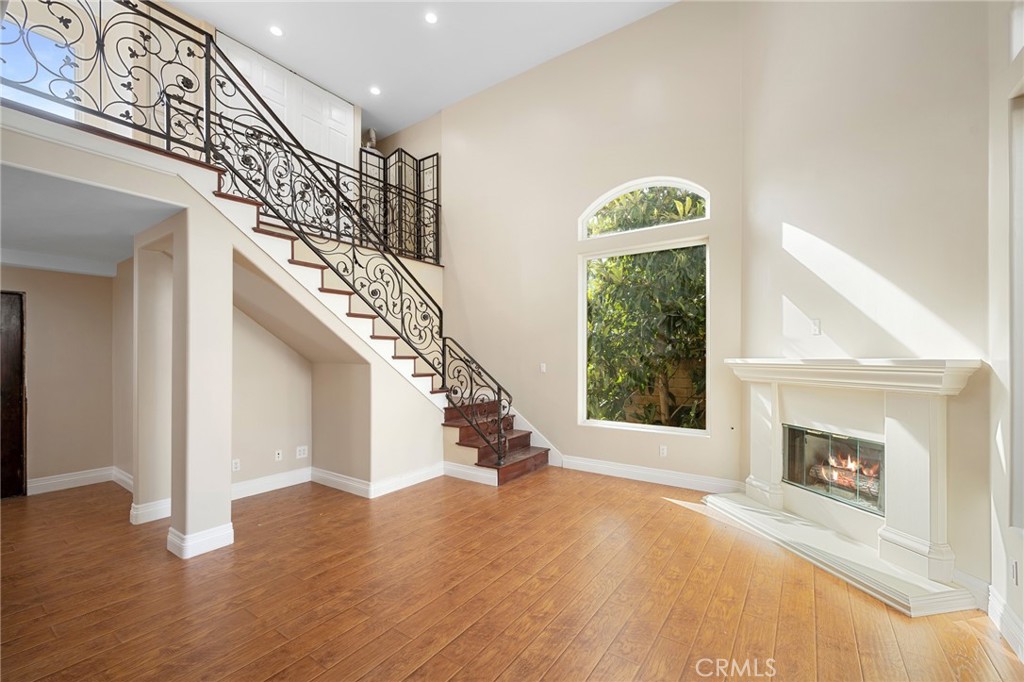 6541 Elmo Street Tujunga, CA 91042 - Photo 2 of 20 a view of entryway and hall with wooden floor