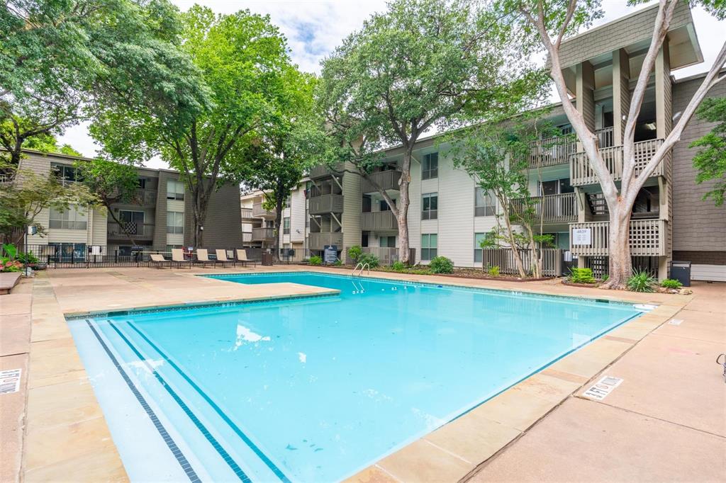 4837 Cedar Springs Road, Unit 110 Dallas, TX 75219 - Photo 14 of 21 a view of outdoor space yard swimming pool and sitting area