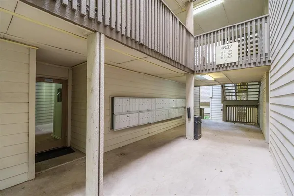 a view of a wrought iron fences in front of house
