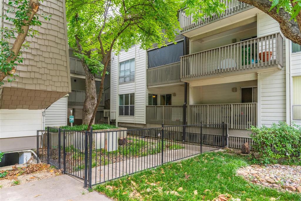 4837 Cedar Springs Road, Unit 110 Dallas, TX 75219 - Photo 18 of 21 a view of a wrought iron fences in front of house