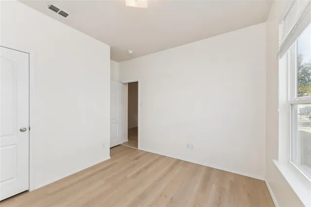 an empty room with a window