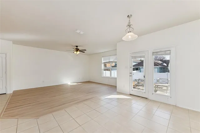 a view of an empty room with window