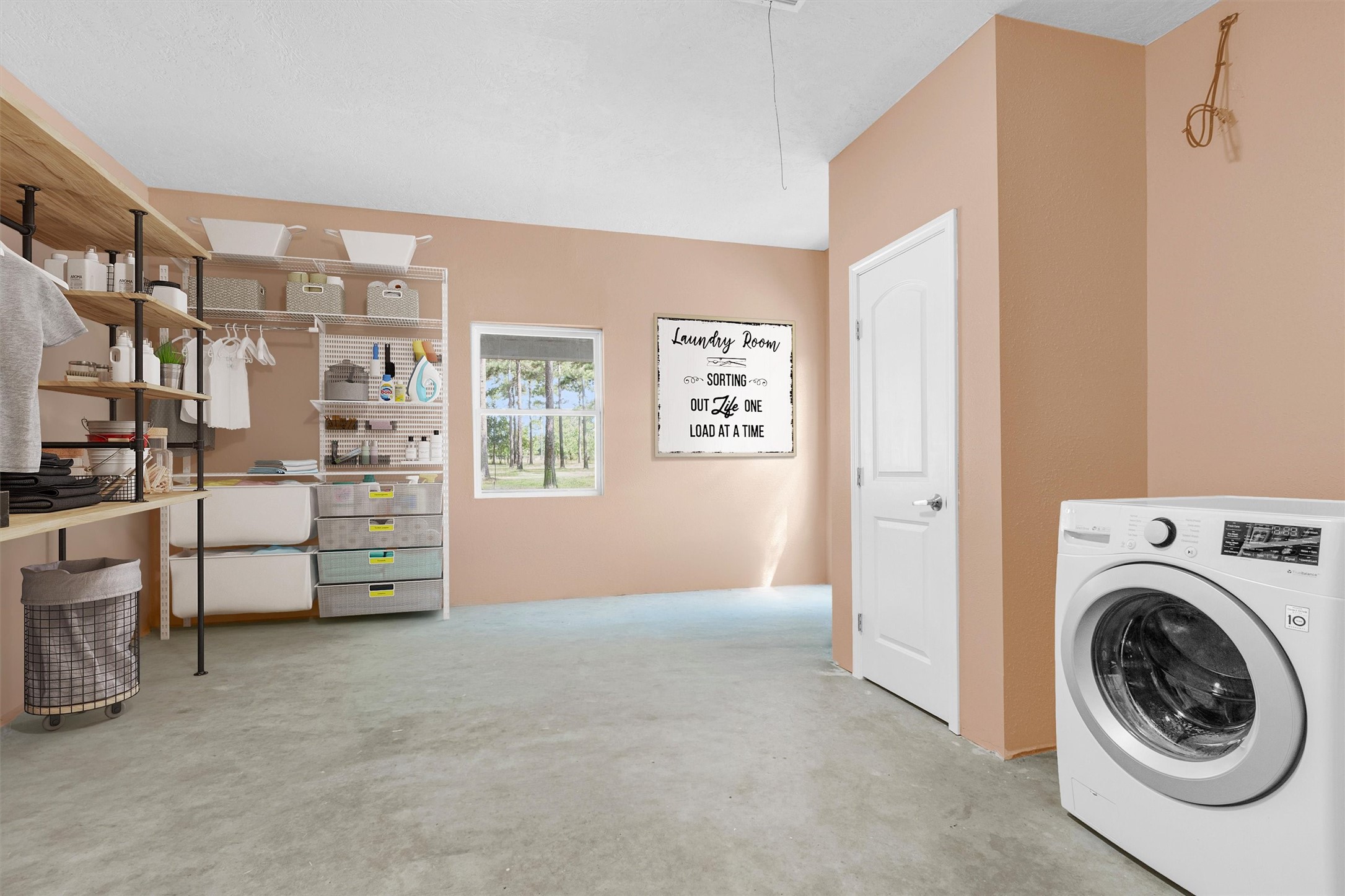 9321 North Walker Road Cleveland, TX 77328 - Photo 36 of 50 Huge Laundry room with AC; Also can be used as a flex room to fit your needs...study, storage or additional living space.