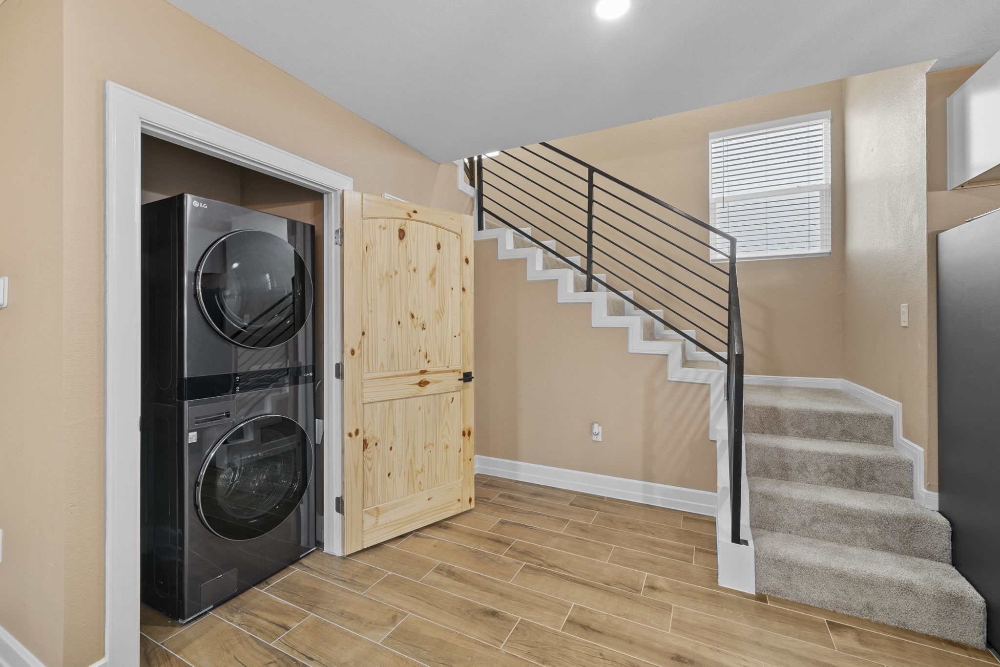 4011 County Road 219 Anderson, TX 77830 - Photo 20 of 38 a view of a hallway with washer and dryer