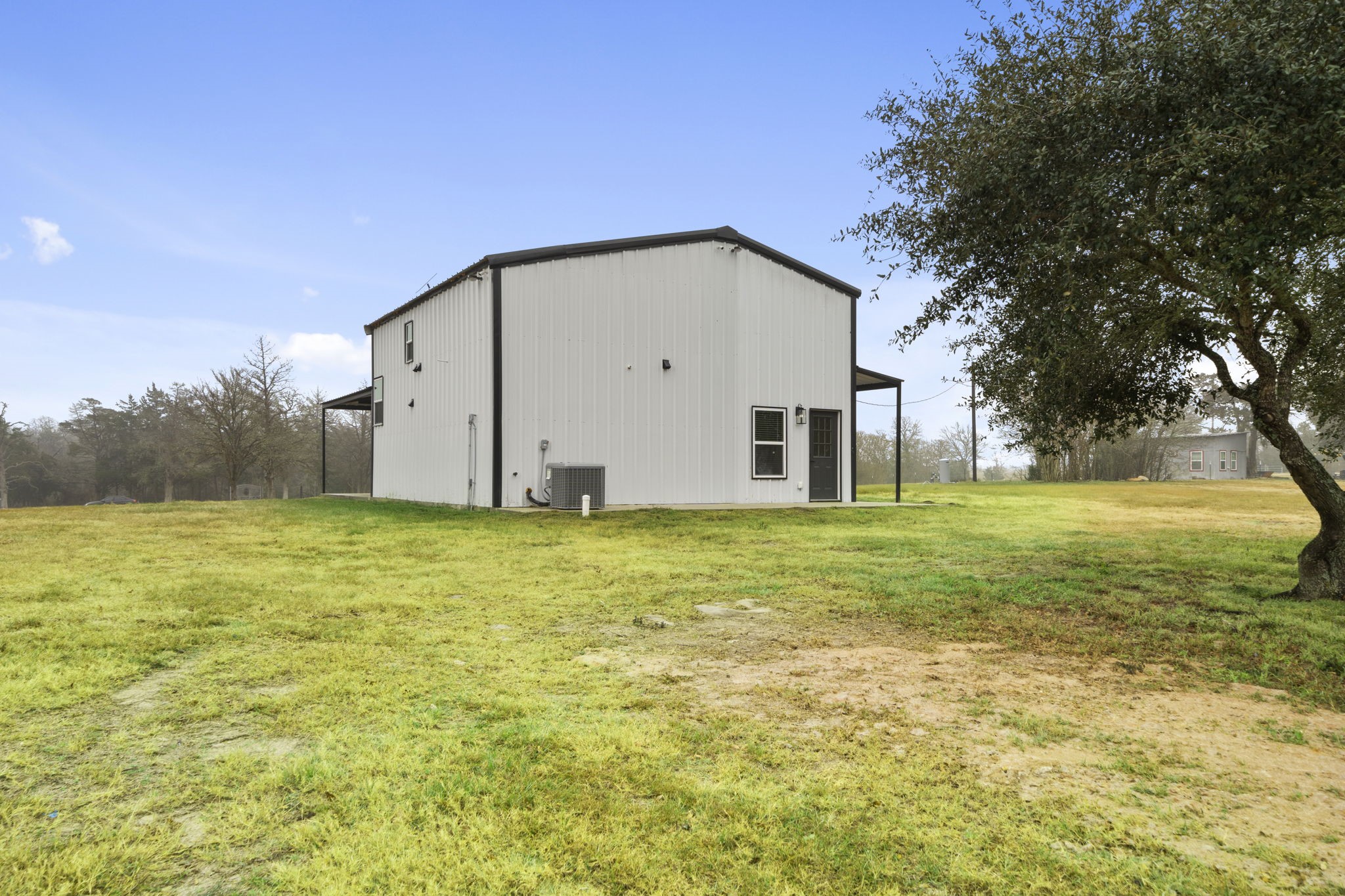 4011 County Road 219 Anderson, TX 77830 - Photo 29 of 38 a view of a house with backyard and trees