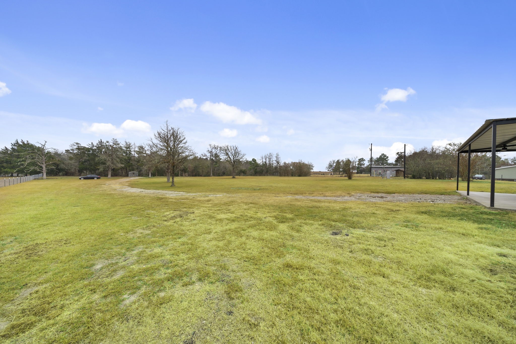 4011 County Road 219 Anderson, TX 77830 - Photo 32 of 38 a view of a swimming pool and an outdoor seating