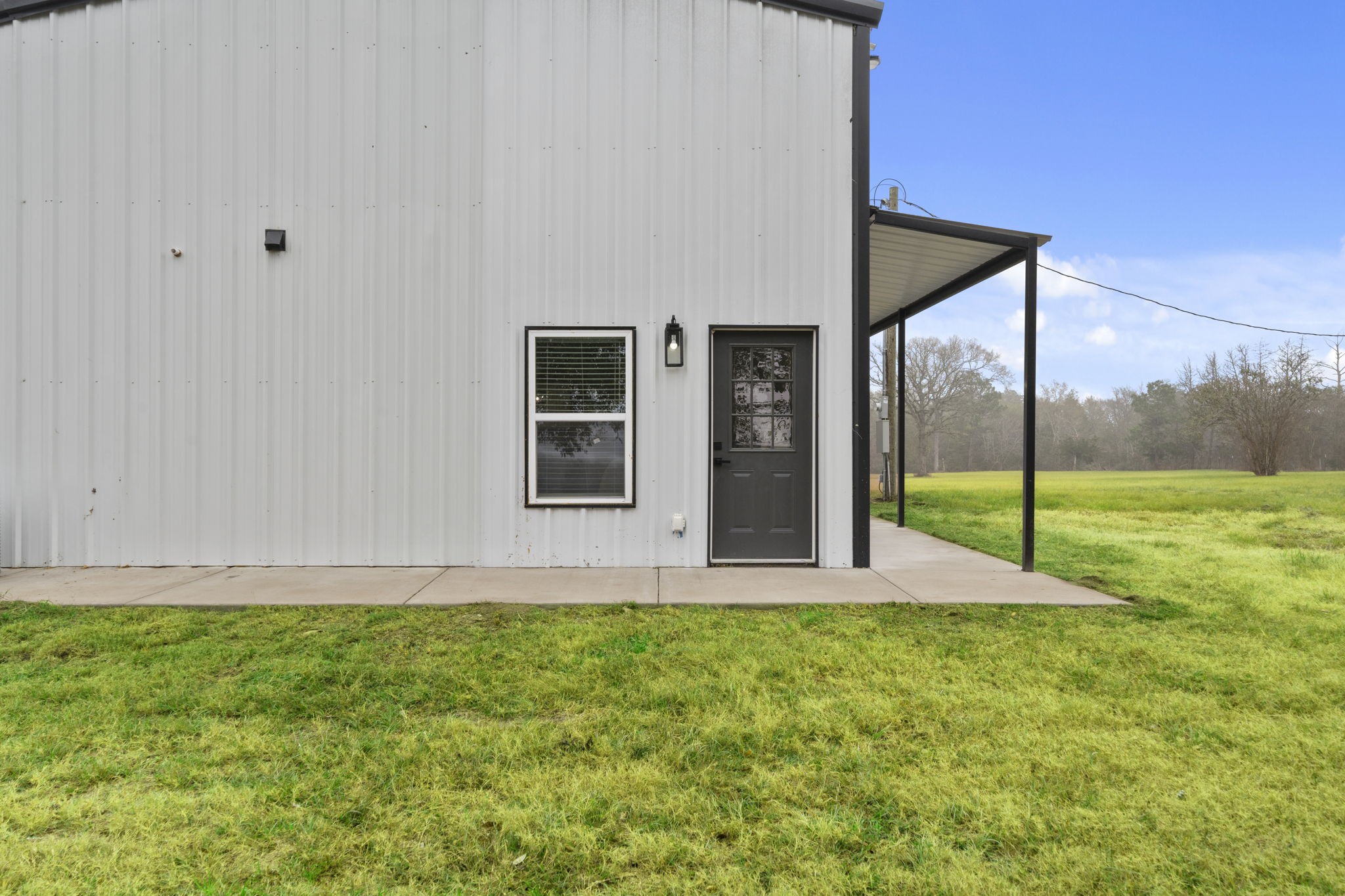 4011 County Road 219 Anderson, TX 77830 - Photo 4 of 38 a view of a house with backyard and porch