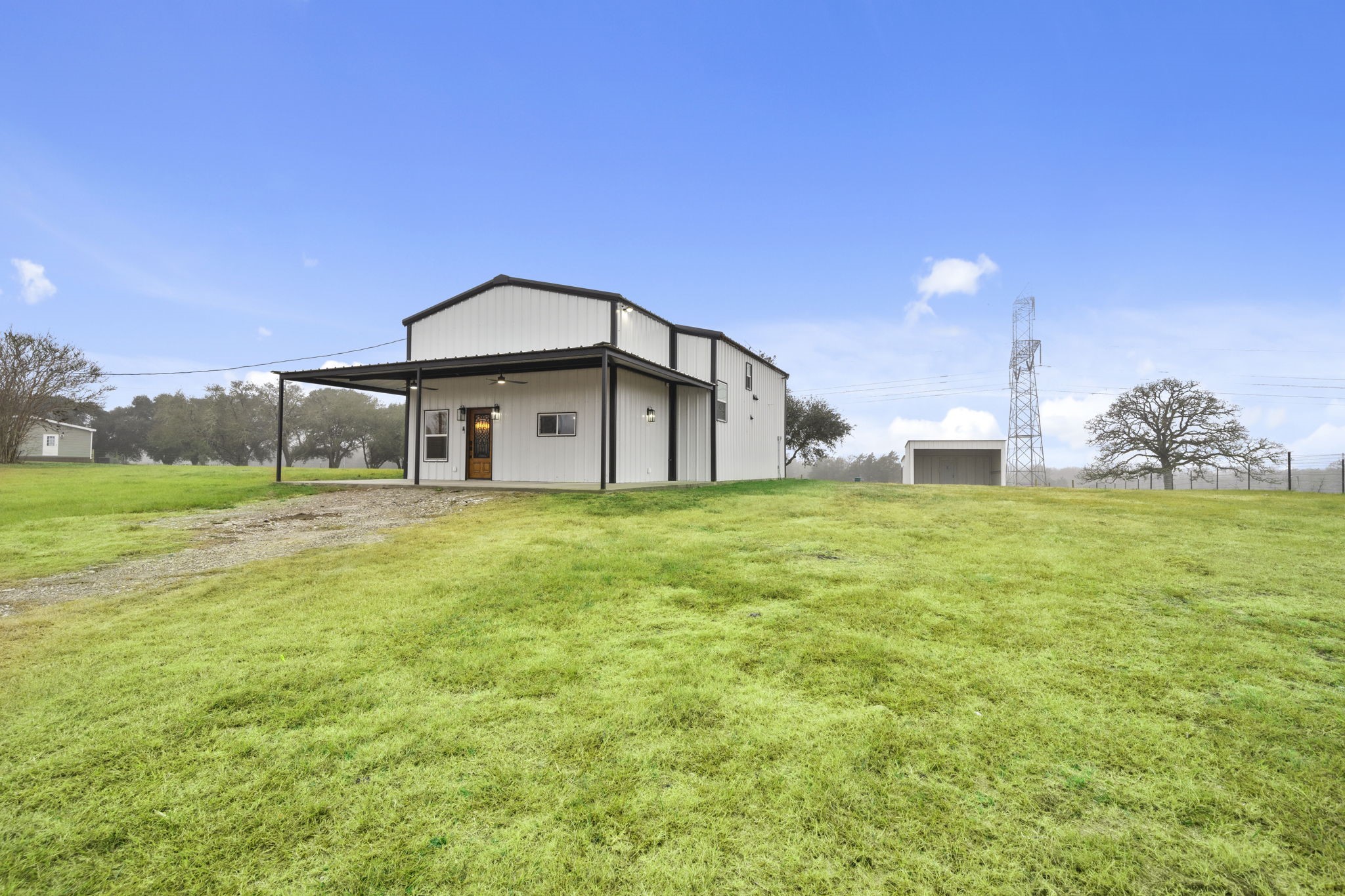 4011 County Road 219 Anderson, TX 77830 - Photo 5 of 38 a house view with swimming pool in front of it