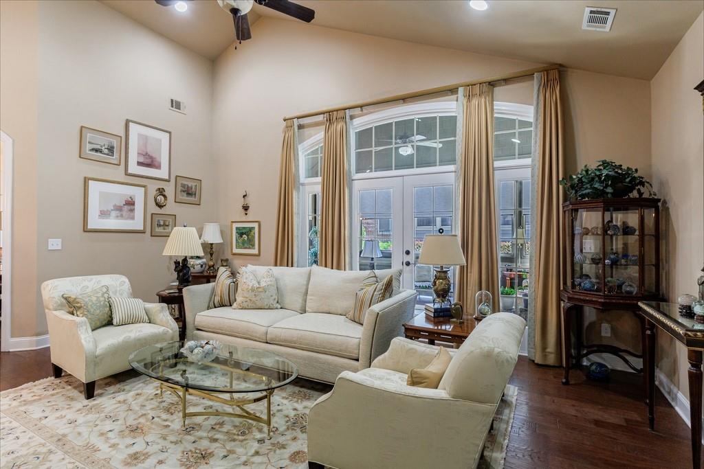120 Chastain Road Northwest, Unit 1002 Kennesaw, GA 30144 - Photo 11 of 35 a living room with furniture or couch and a wooden floor