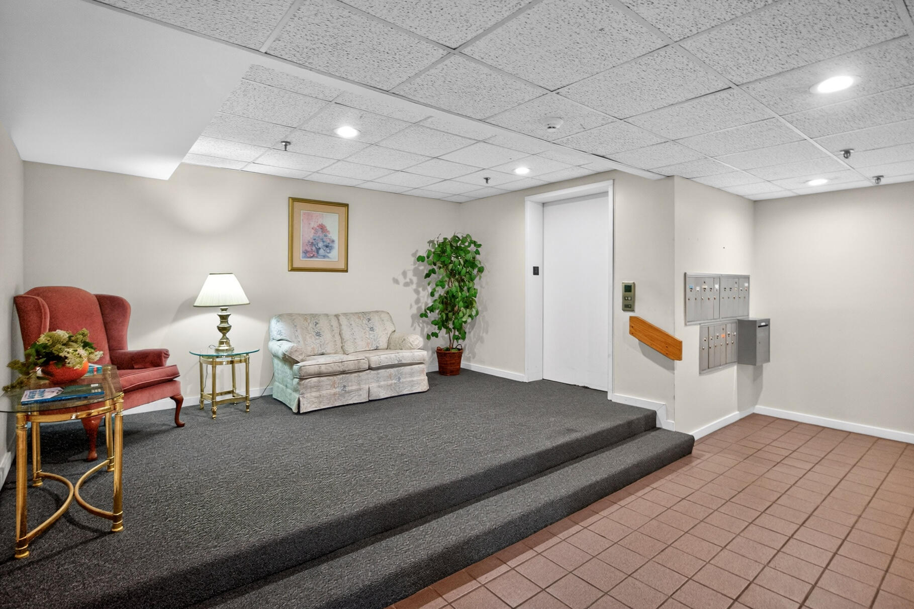 45 Main Street, Unit 37 Wareham, MA 02571 - Photo 5 of 46 First Floor Sitting Area/Elevator