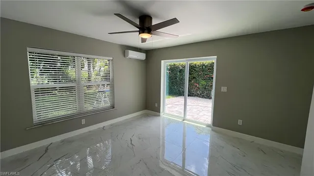 an empty room with windows