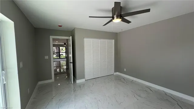 a view of a house with backyard and garden